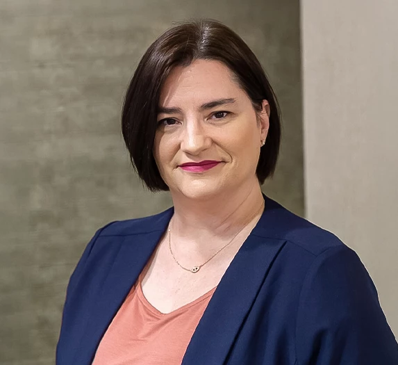 a woman smiling for a picture