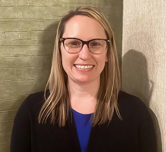 a woman smiling at camera