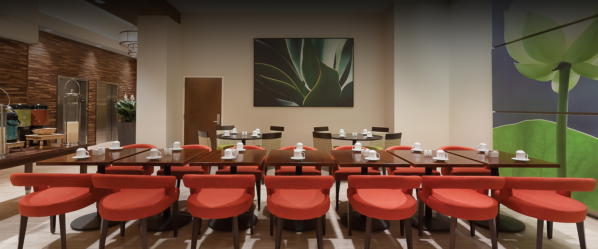 a room with tables and chairs