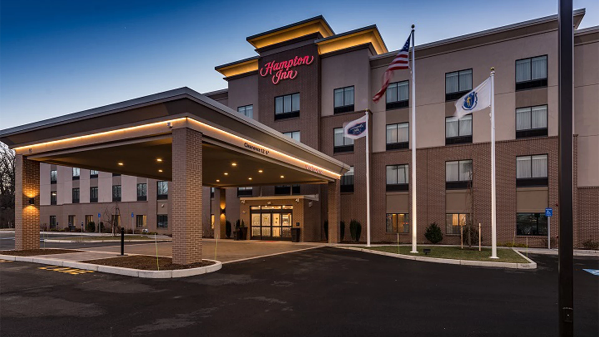 a building with flags in front of it