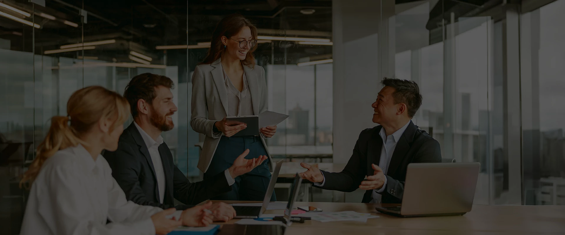a group of people in a meeting