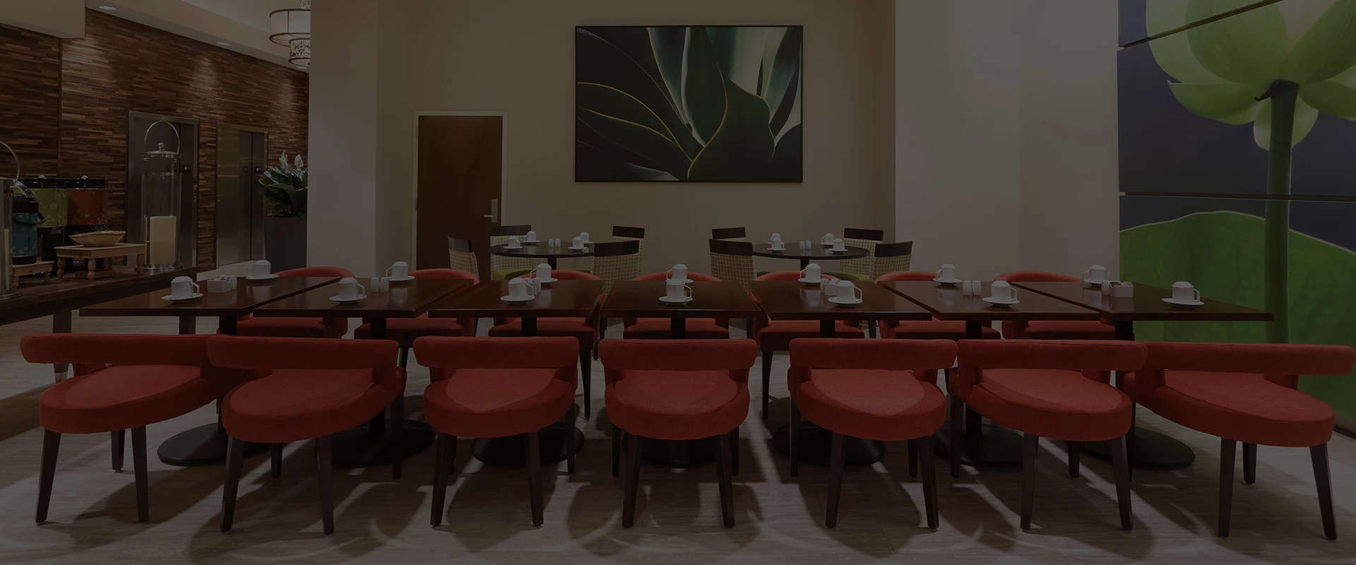 a room with tables and chairs