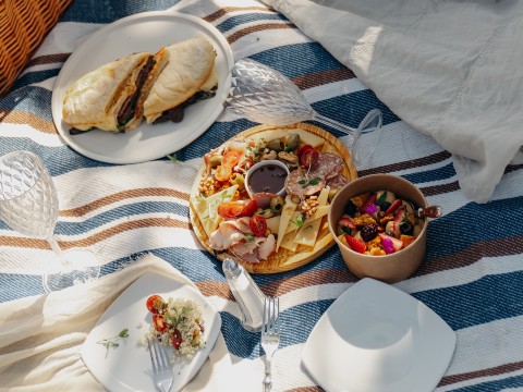 a plate of food on a blanket