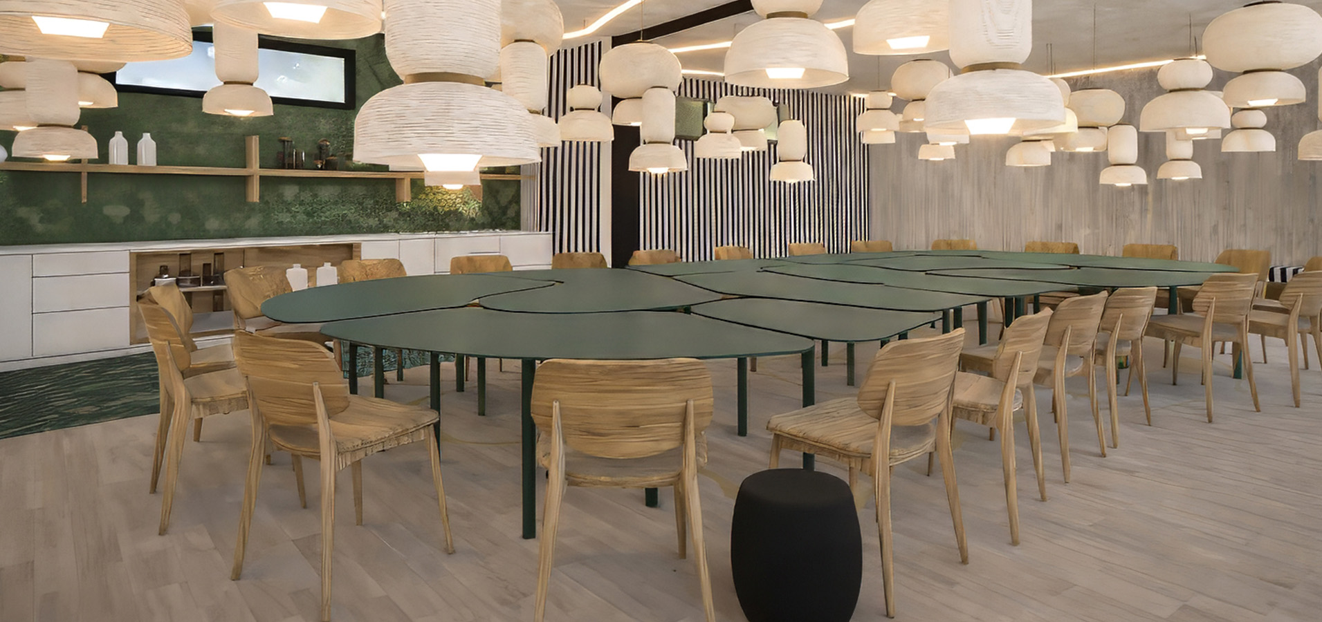 a room with a round table and chairs