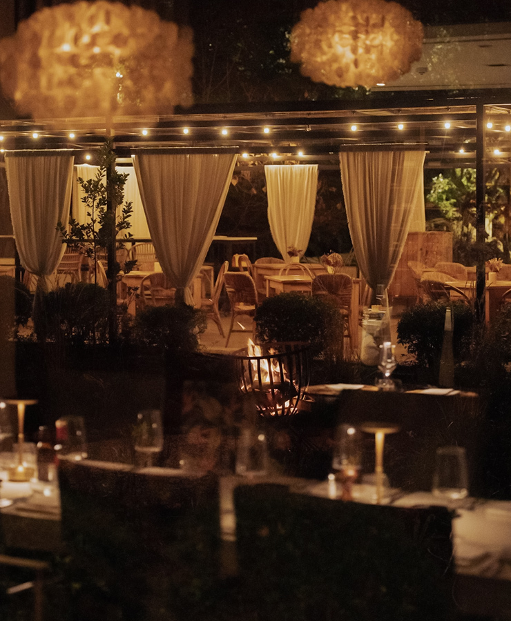 a restaurant with tables and chairs