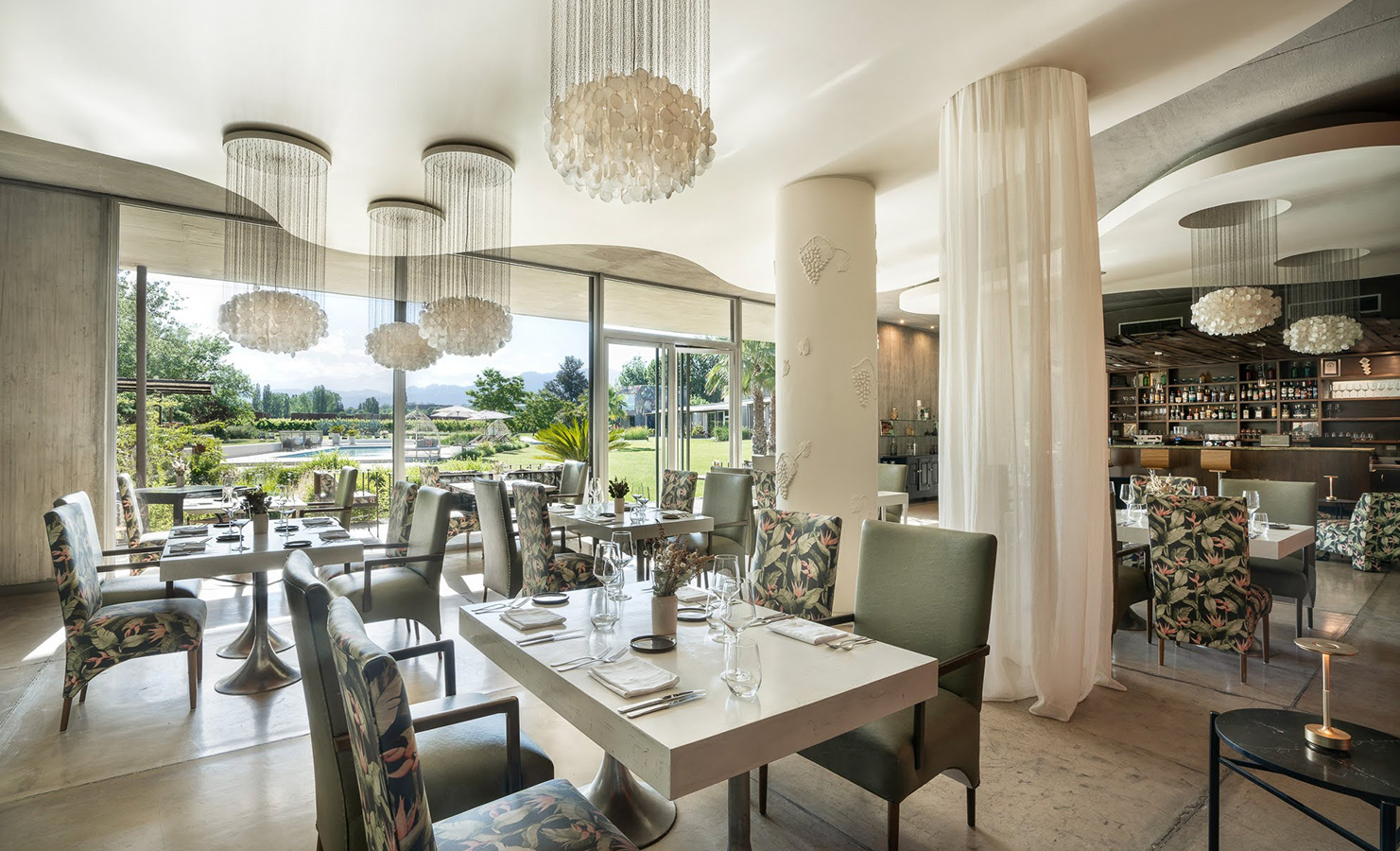 a restaurant with tables and chairs