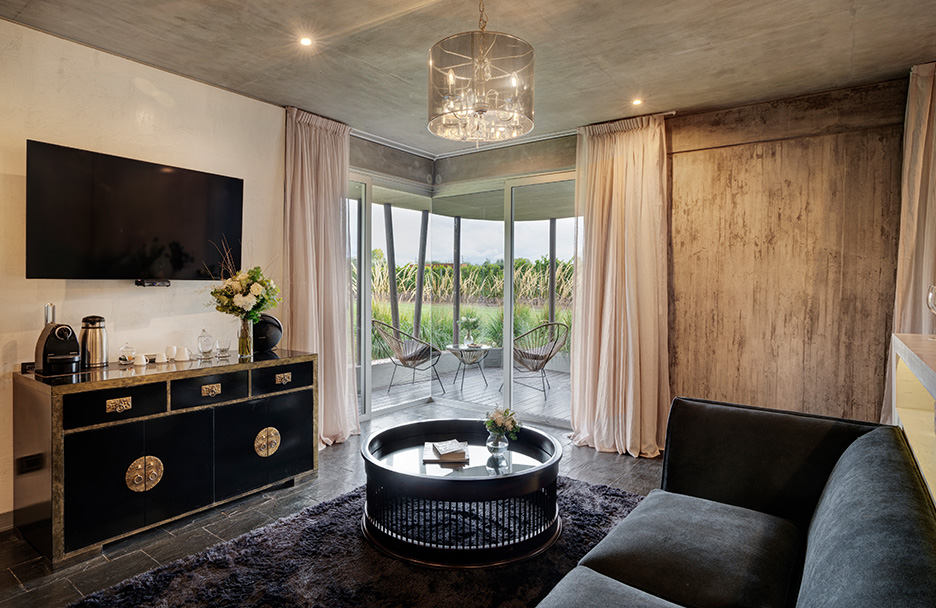 a living room with a couch and a tv