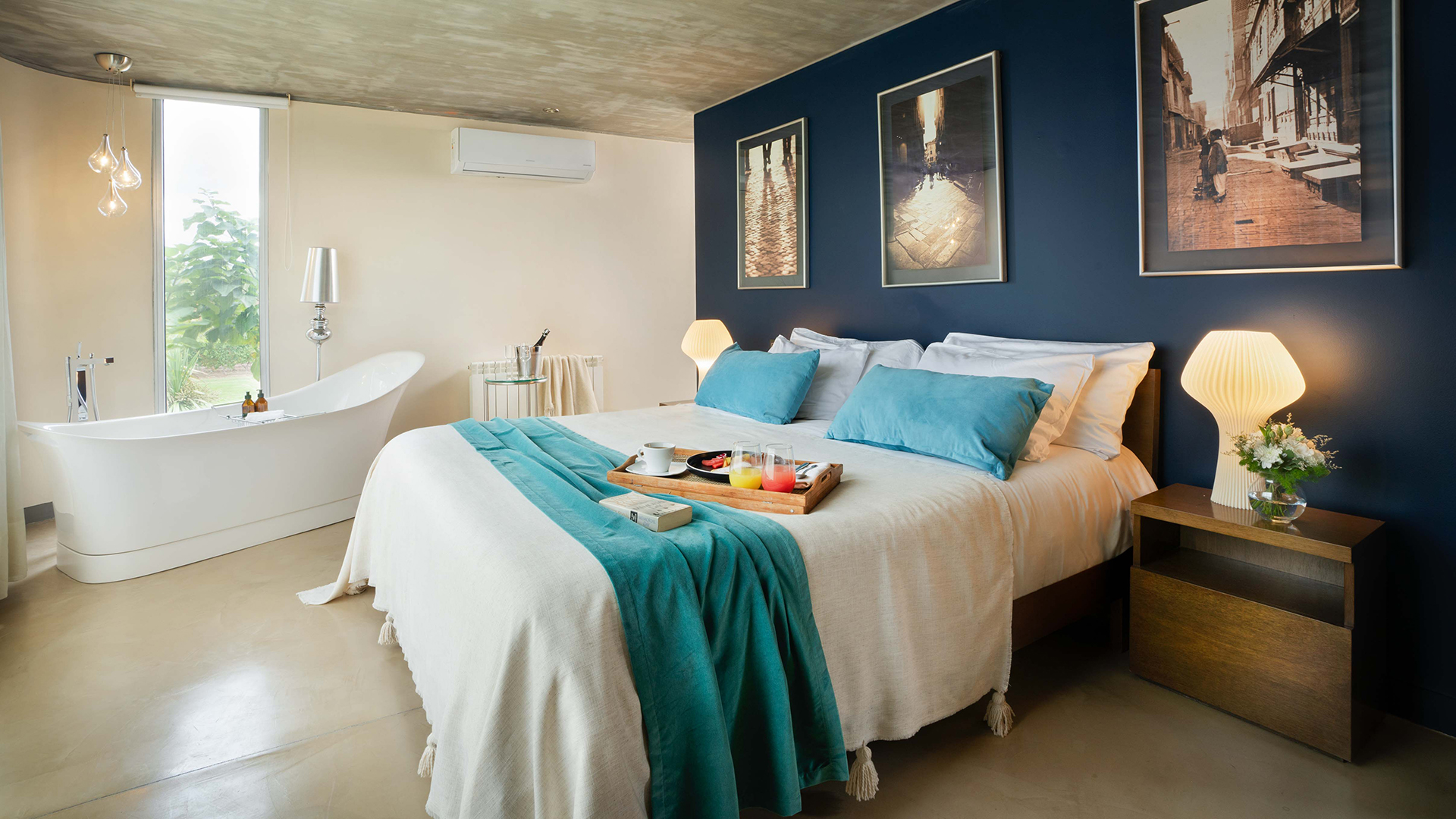a bed with a tray of food on it