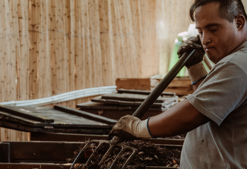 a man holding a metal shovel