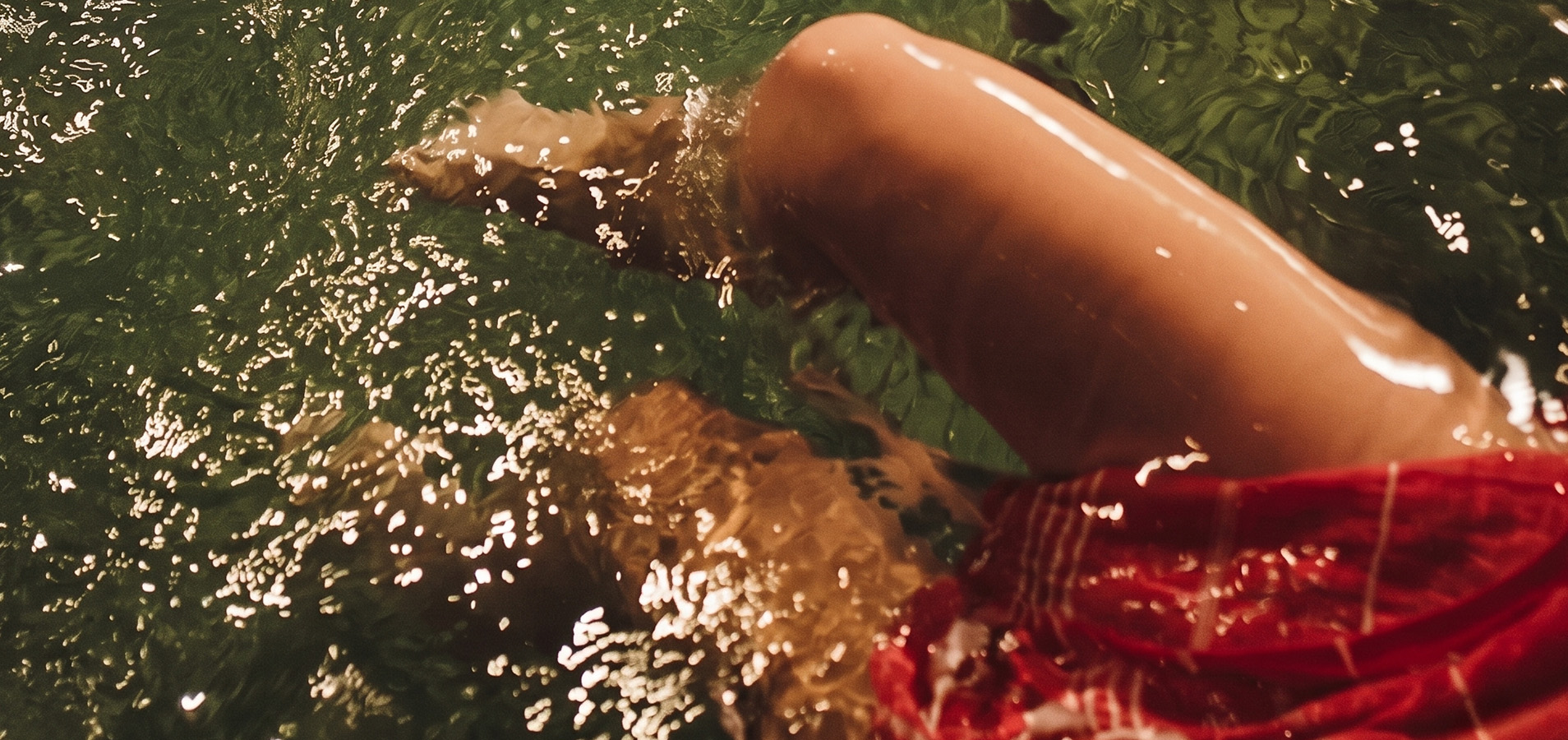a person's legs in water