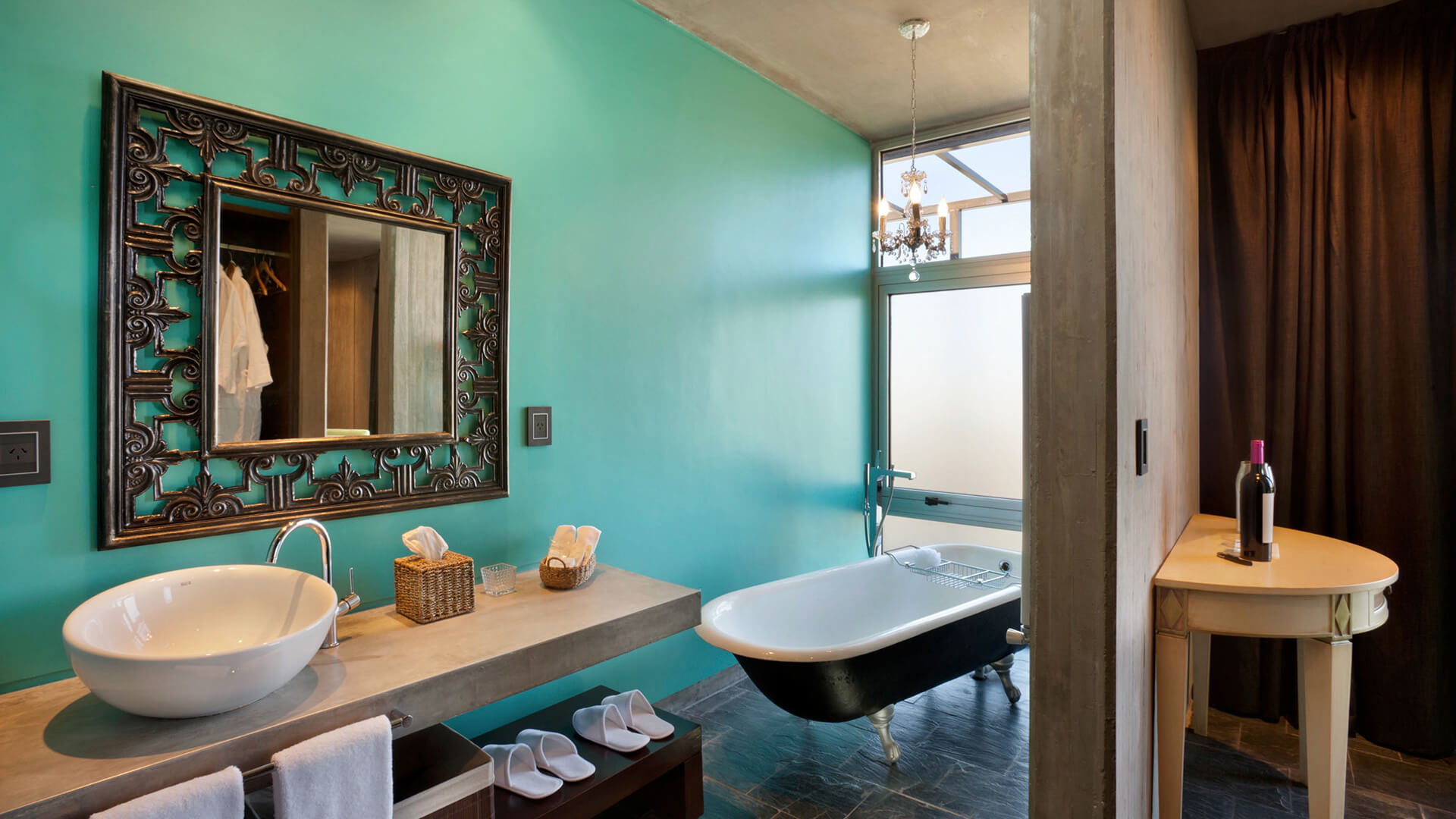 a bathroom with a tub and sink