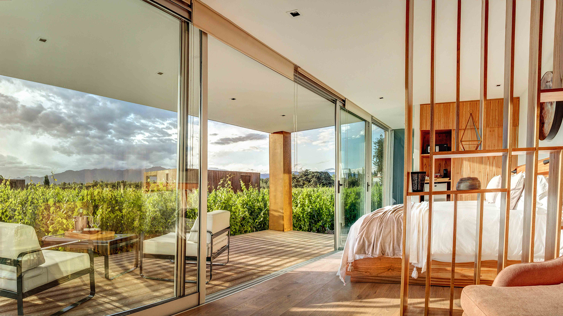 a bedroom with glass doors