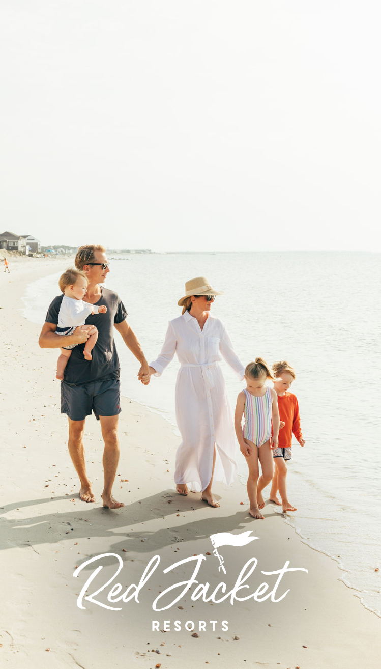 a family walking on a beach