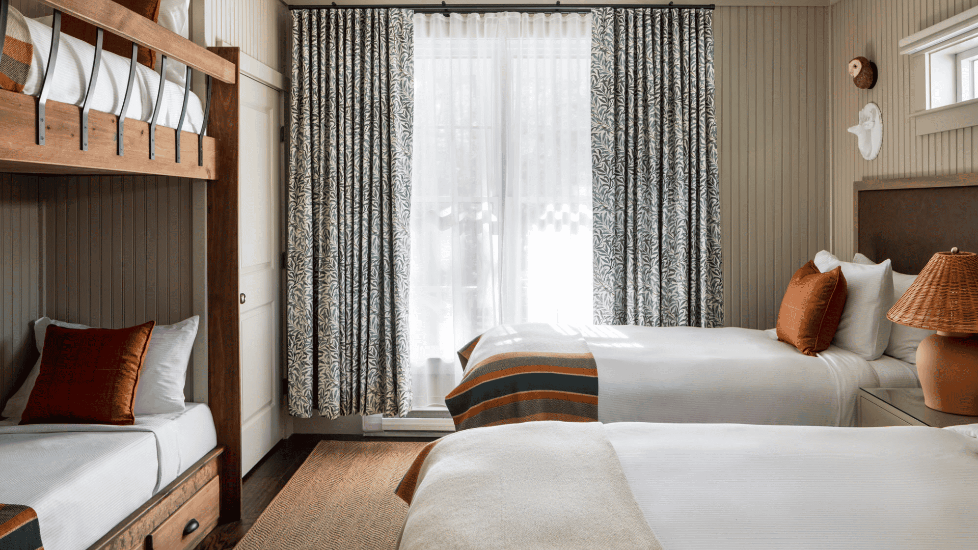 guest room with two twin beds and bunk bed