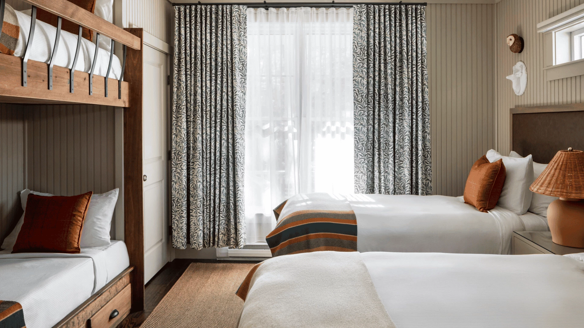 guest room with two twin beds and bunk bed