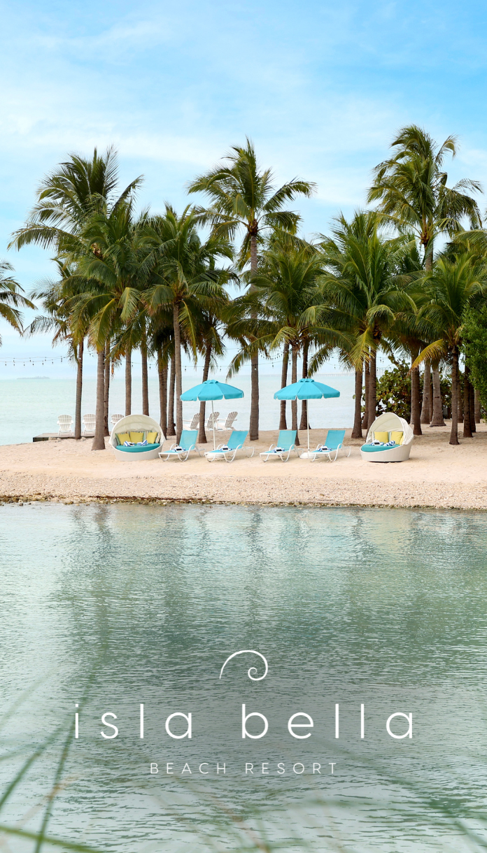 a beach with chairs and umbrellas on a sandy beach