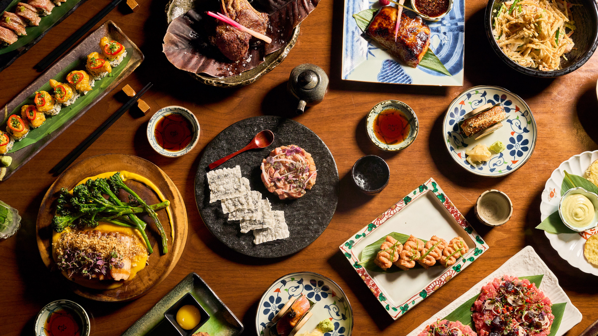 a table with different plates of food