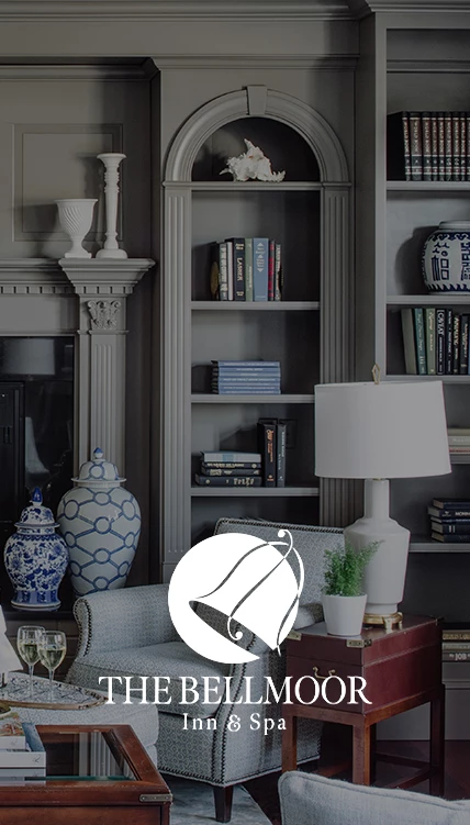 a room with a bookcase and a couch