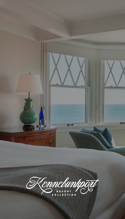 a bedroom with a bed and a lamp