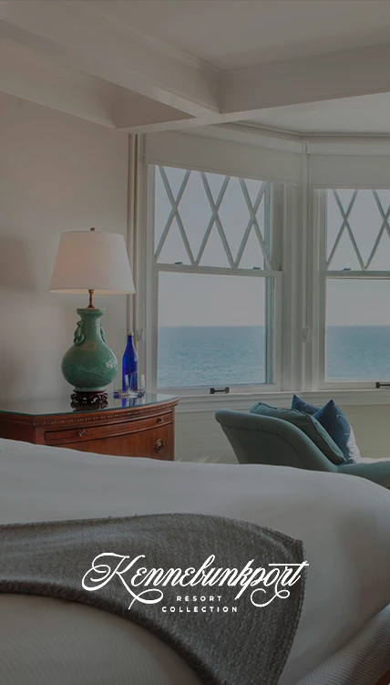 a bedroom with a bed and a lamp