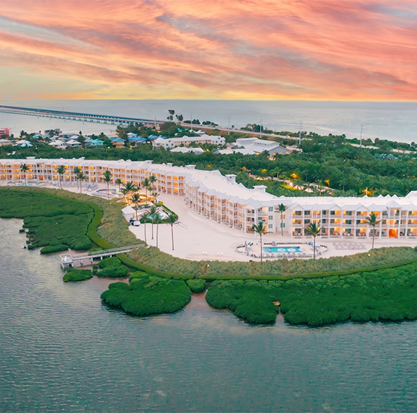 a large building on an island surrounded by water
