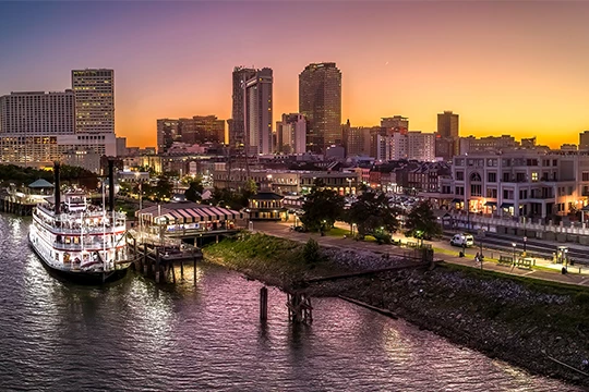 a city skyline with a pier and buildings