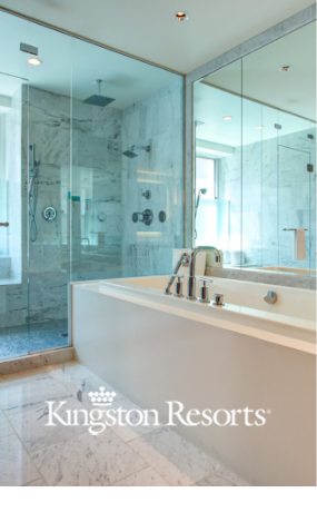 a bathroom with a bathtub and shower