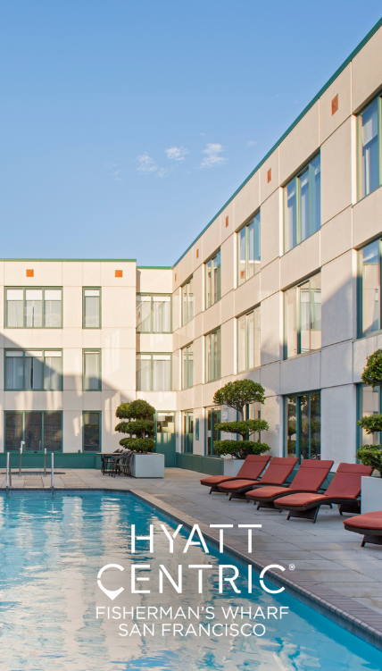 a pool in front of a building