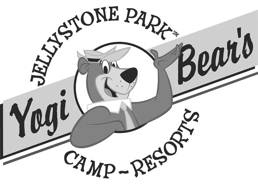 a cartoon bear with a sign