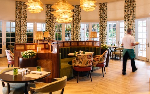 a room with tables and chairs