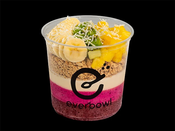 a plastic cup with fruit in it