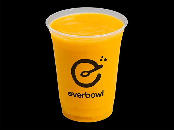 a plastic cup with a yellow liquid in it
