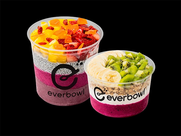 a couple of bowls of fruit and oatmeal