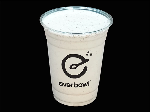 a white liquid in a plastic cup