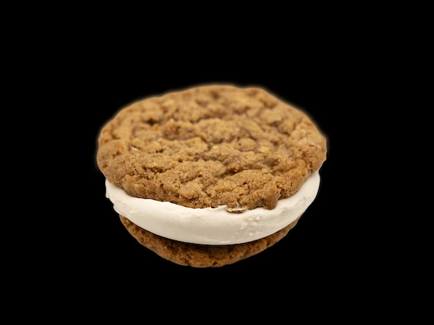 a cookie with a white frosting