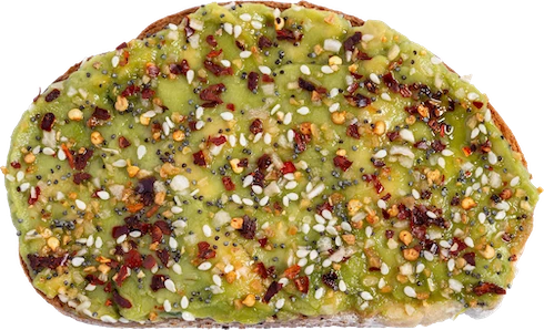 a piece of bread with green sauce and spices