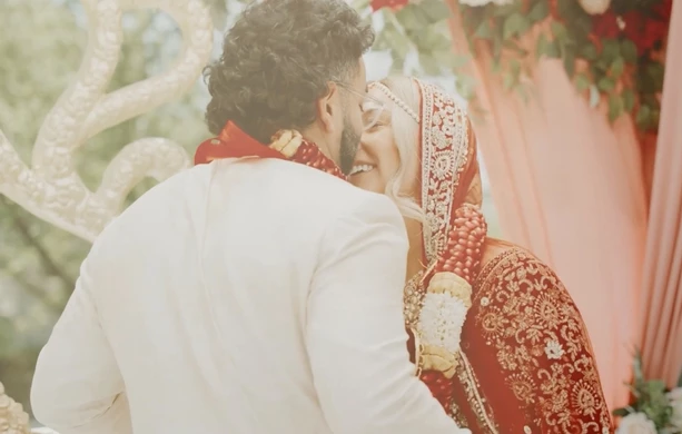 a man and woman kissing