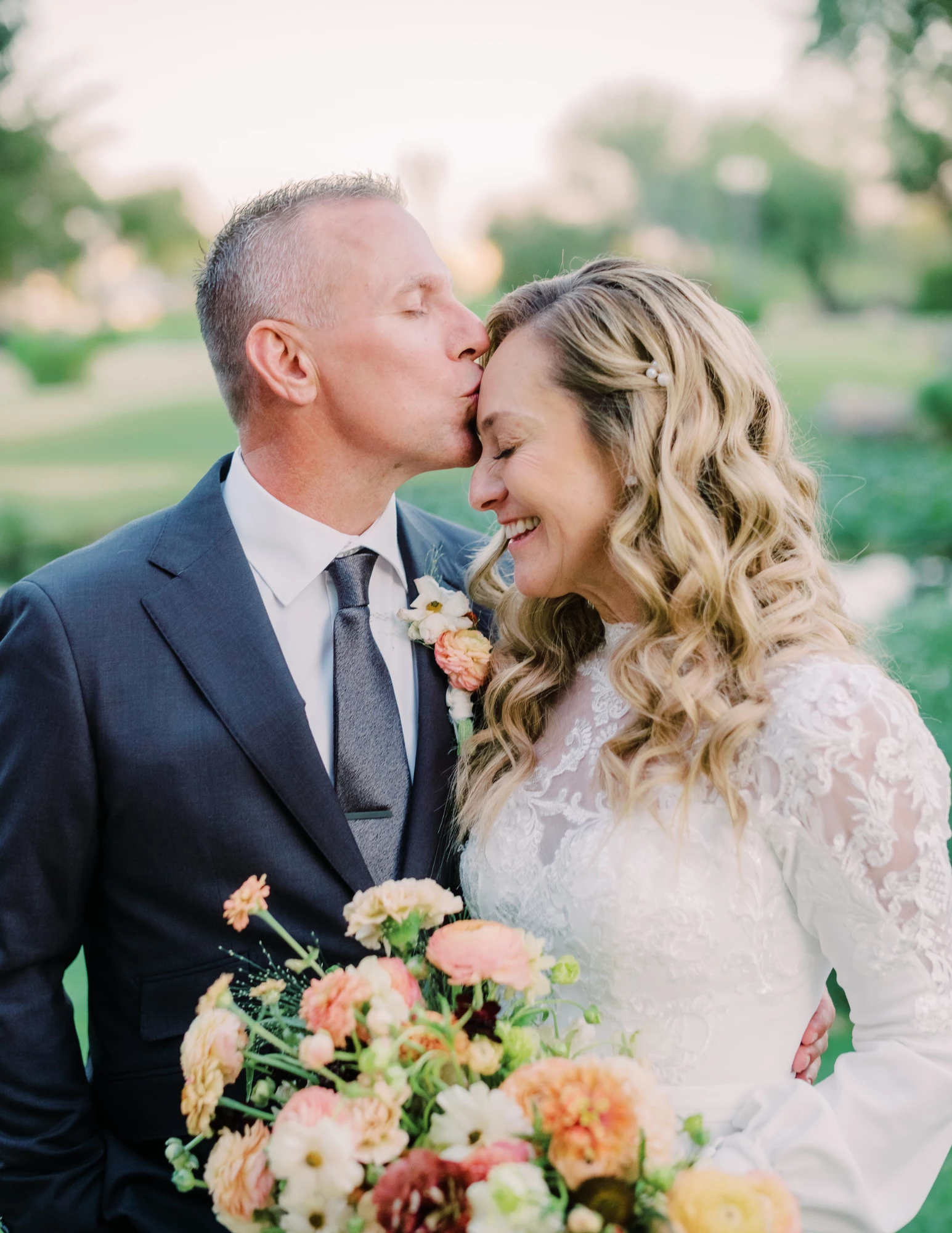 a man and woman kissing each other