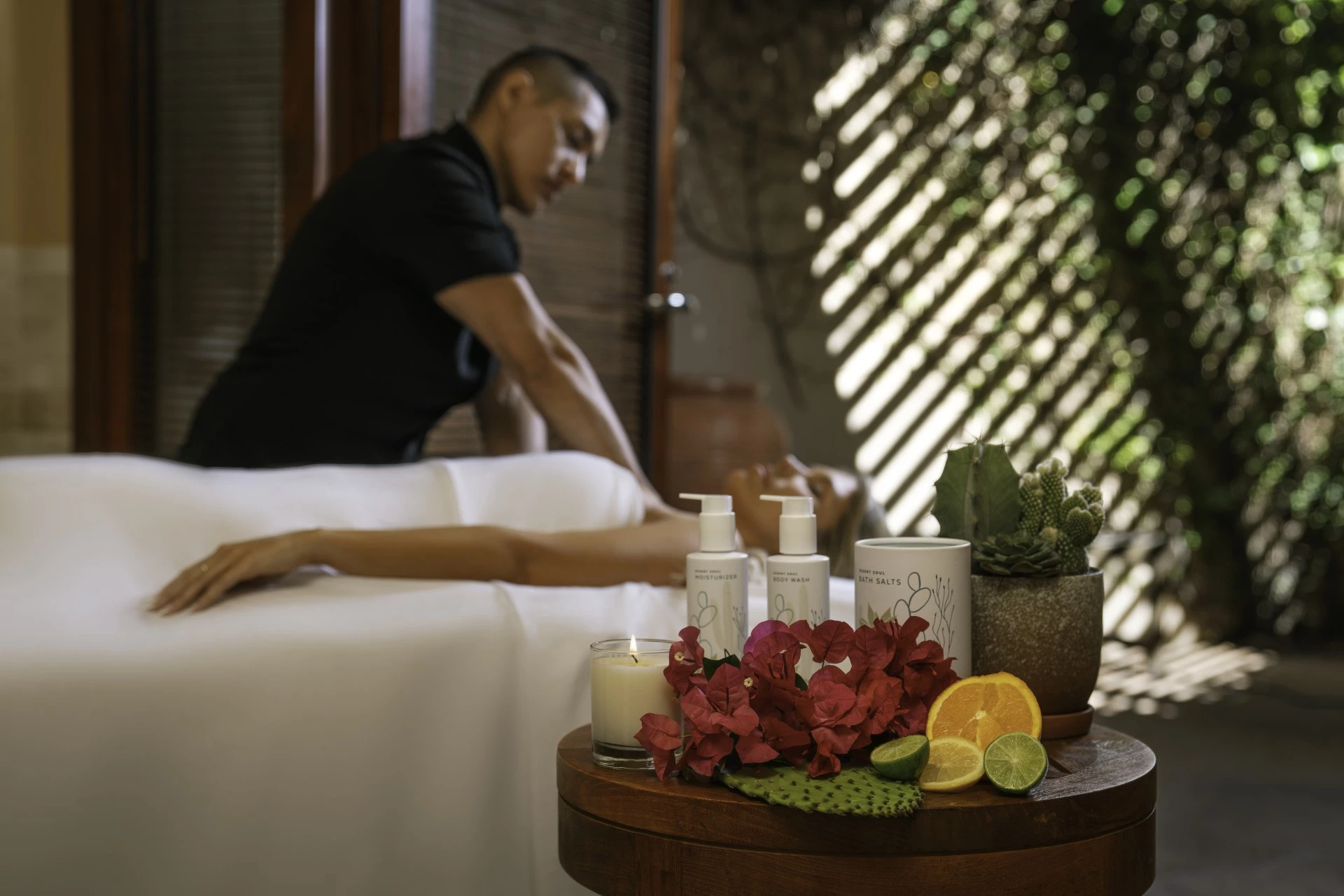 a woman lying on a massage table