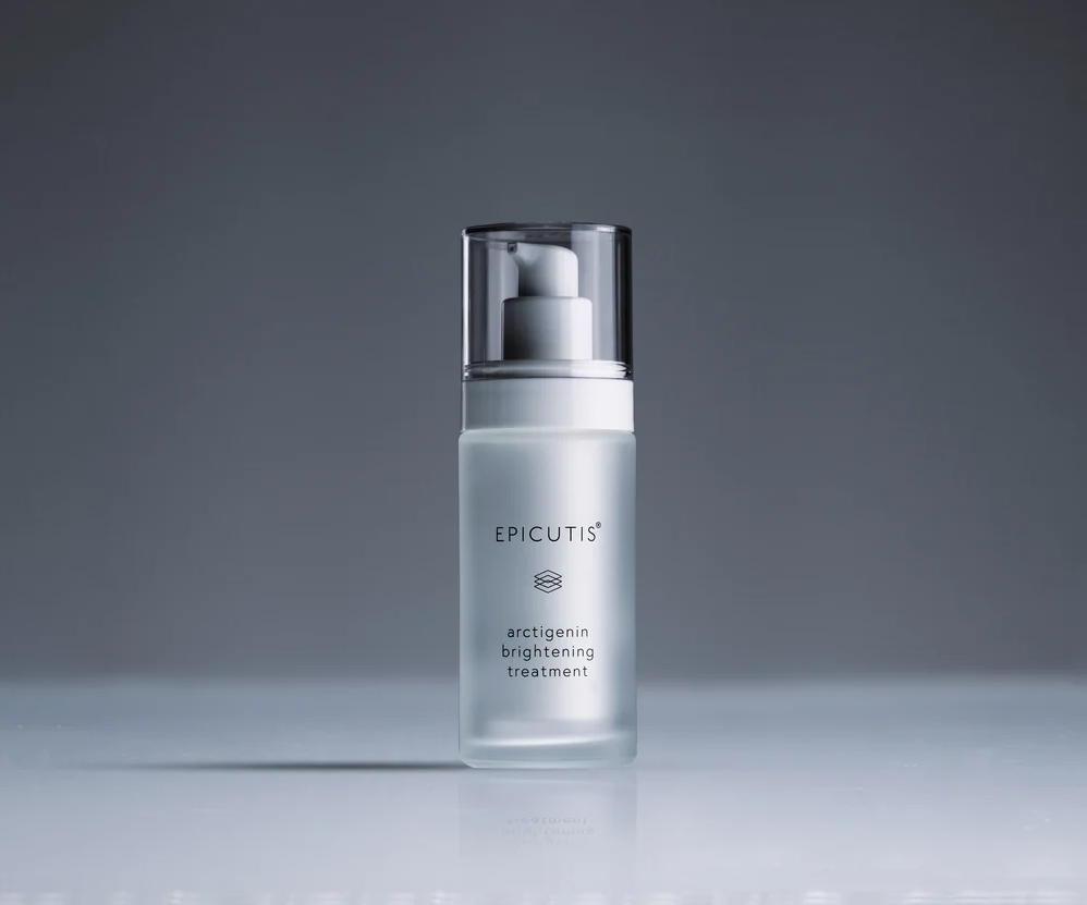 a white bottle with a dispenser