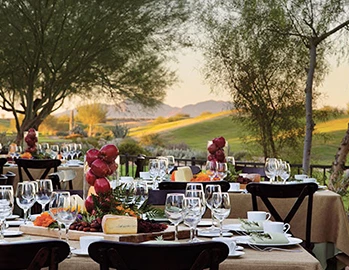 Elegant table laid out outdoors