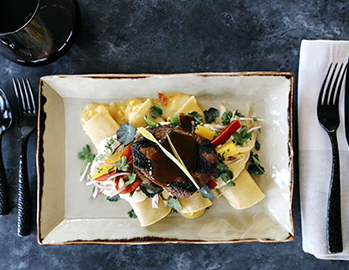 taco dish on a black table