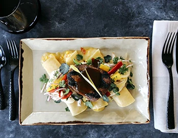 taco dish on a black table