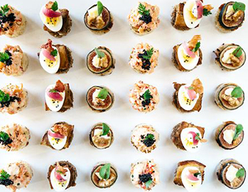 An assortment of various types of sushi rolls