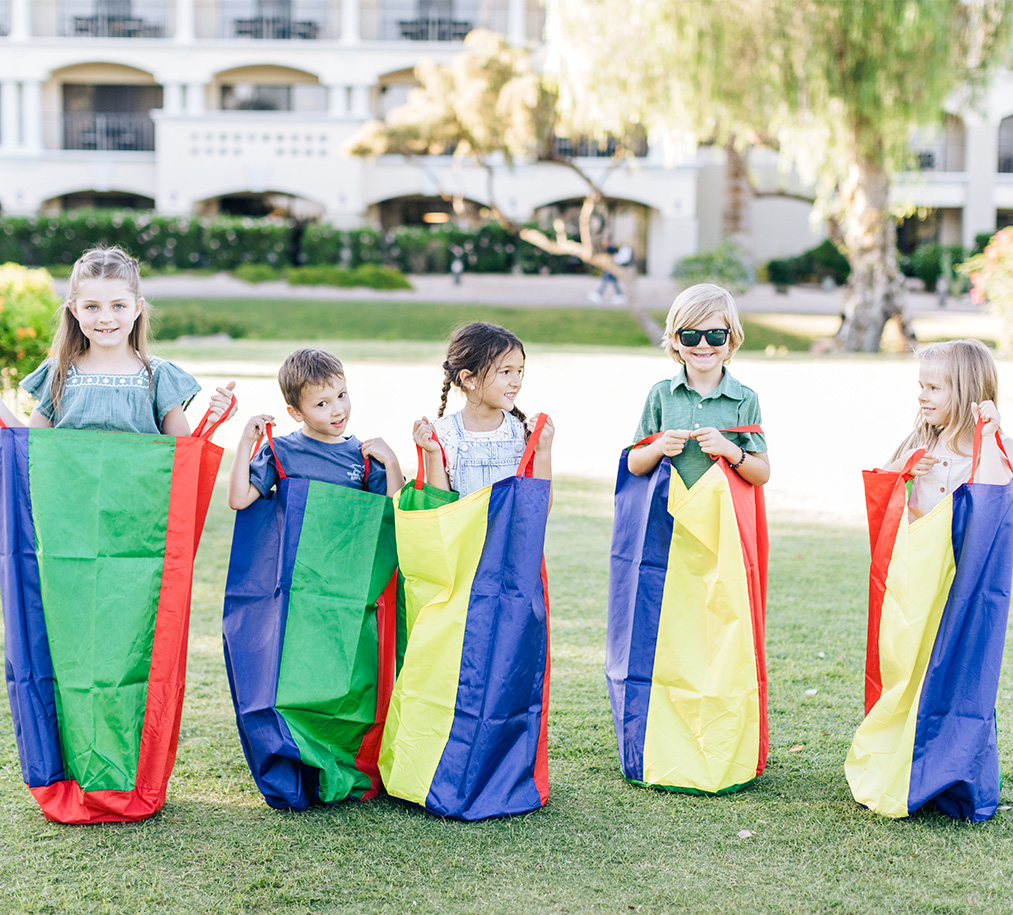 a group of kids playing in a bag