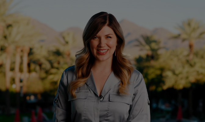 a woman smiling outside