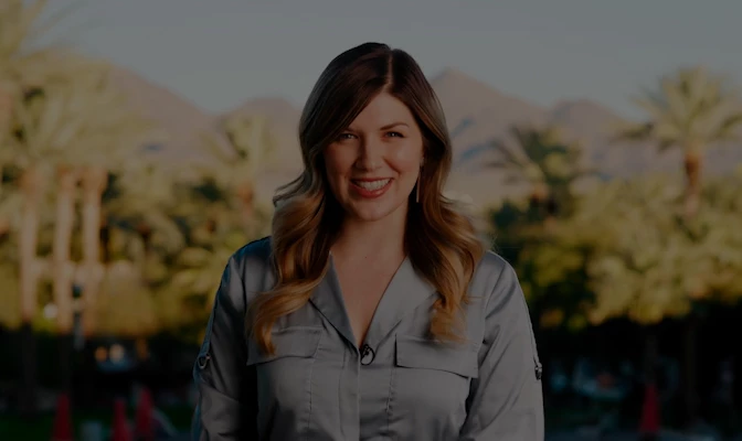 a woman smiling outside