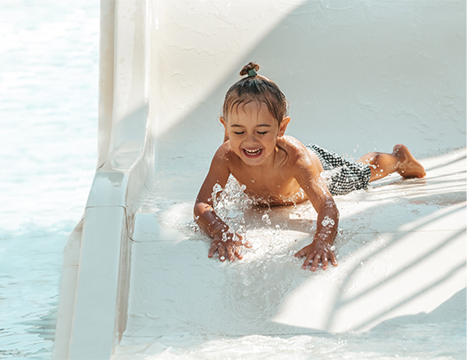 a child on a water slide