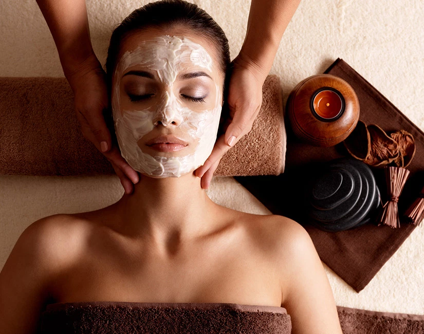 Woman getting a facial at a spa 