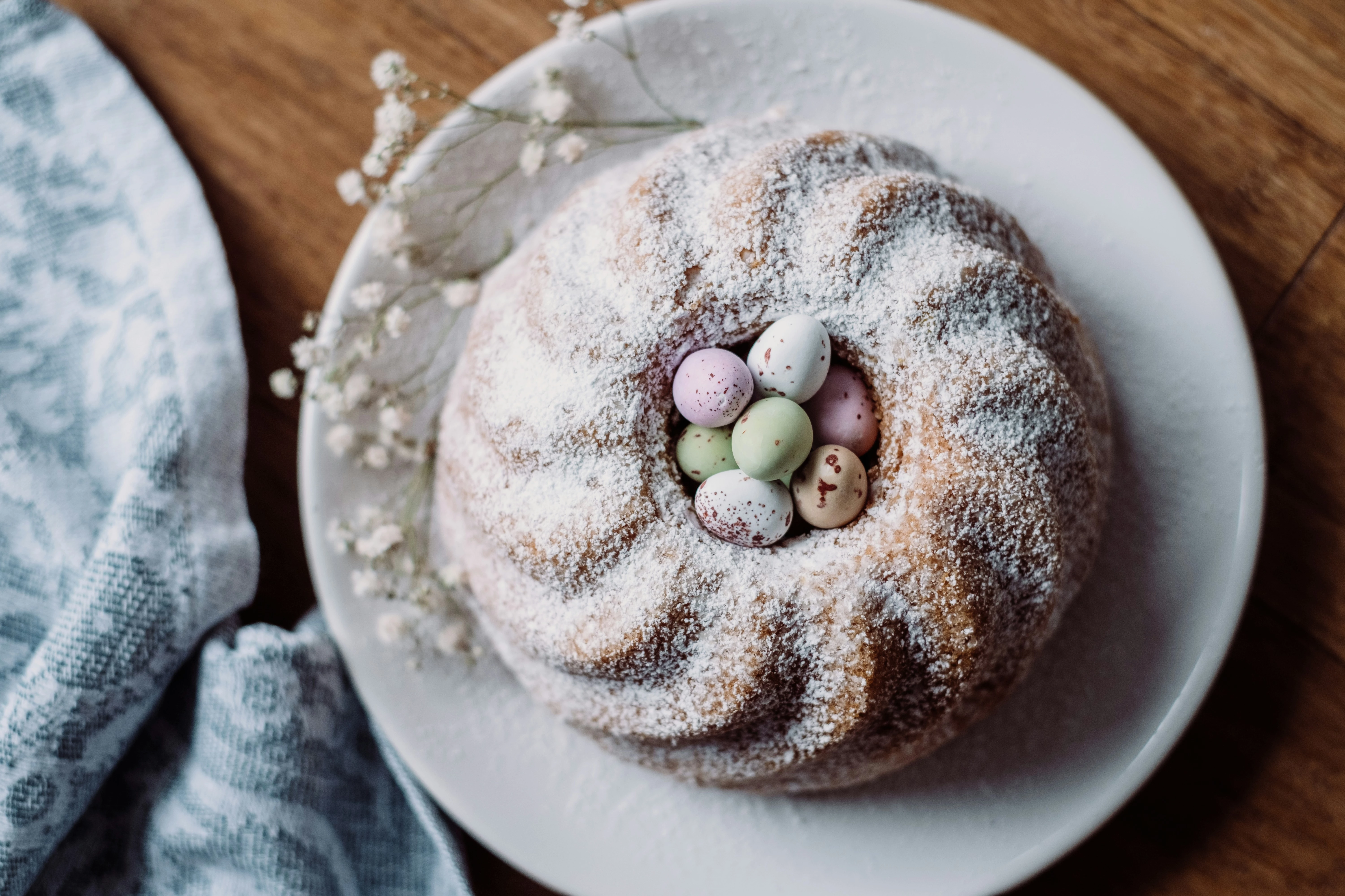 a cake with small chocolate eggs on top